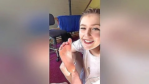 Playful Amateur Girl Sucking Her Toes And Licking Her Foot In A Solo